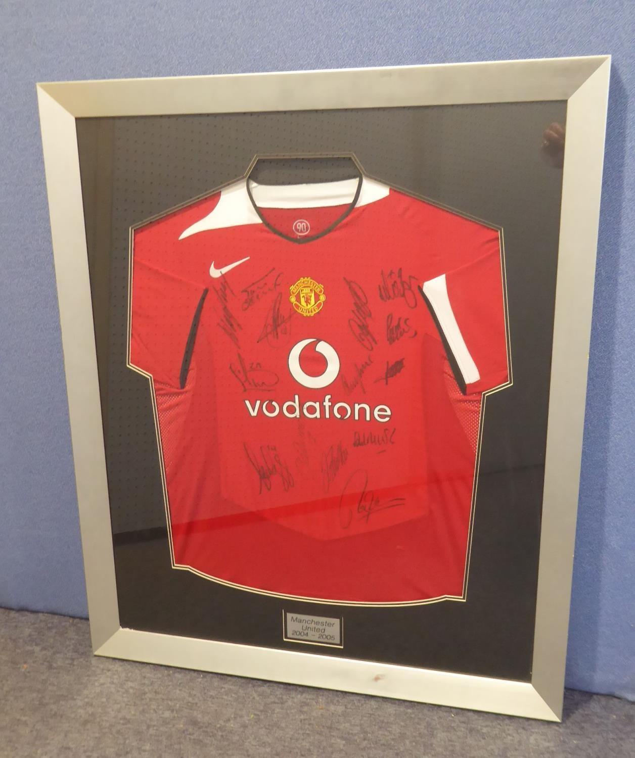 MANCHESTER UNITED 2004-2005 SEASON SIGNED REPLICA FOOTBALL SHIRT, bearing fourteen signatures,