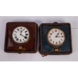 TWO POCKET WATCHES ON STANDS To include a Finnigans pocket watch in blue leather case, together with