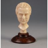 LATE 19th CENTURY NEO-CLASSICAL STYLE CARVED IVORY SMALL BUST OF THE DUKE OF WELLINGTON, 2 3/4" (