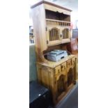 TWENTIETH CENTURY MEXICAN RUSTIC PINE TWO PART CUPBOARD ON STAND