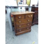 AN EDWARDIAN MAHOGANY SMALL CHEST OF TWO SHORT AND THREE LONG DRAWERS