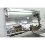 AN ART DECO FRAMELESS BEVELLED EDGE OBLONG WALL MIRROR