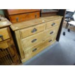 EARLY TWENTIETH CENTURY STRIPPED PINE CHEST OF FOUR DRAWERS