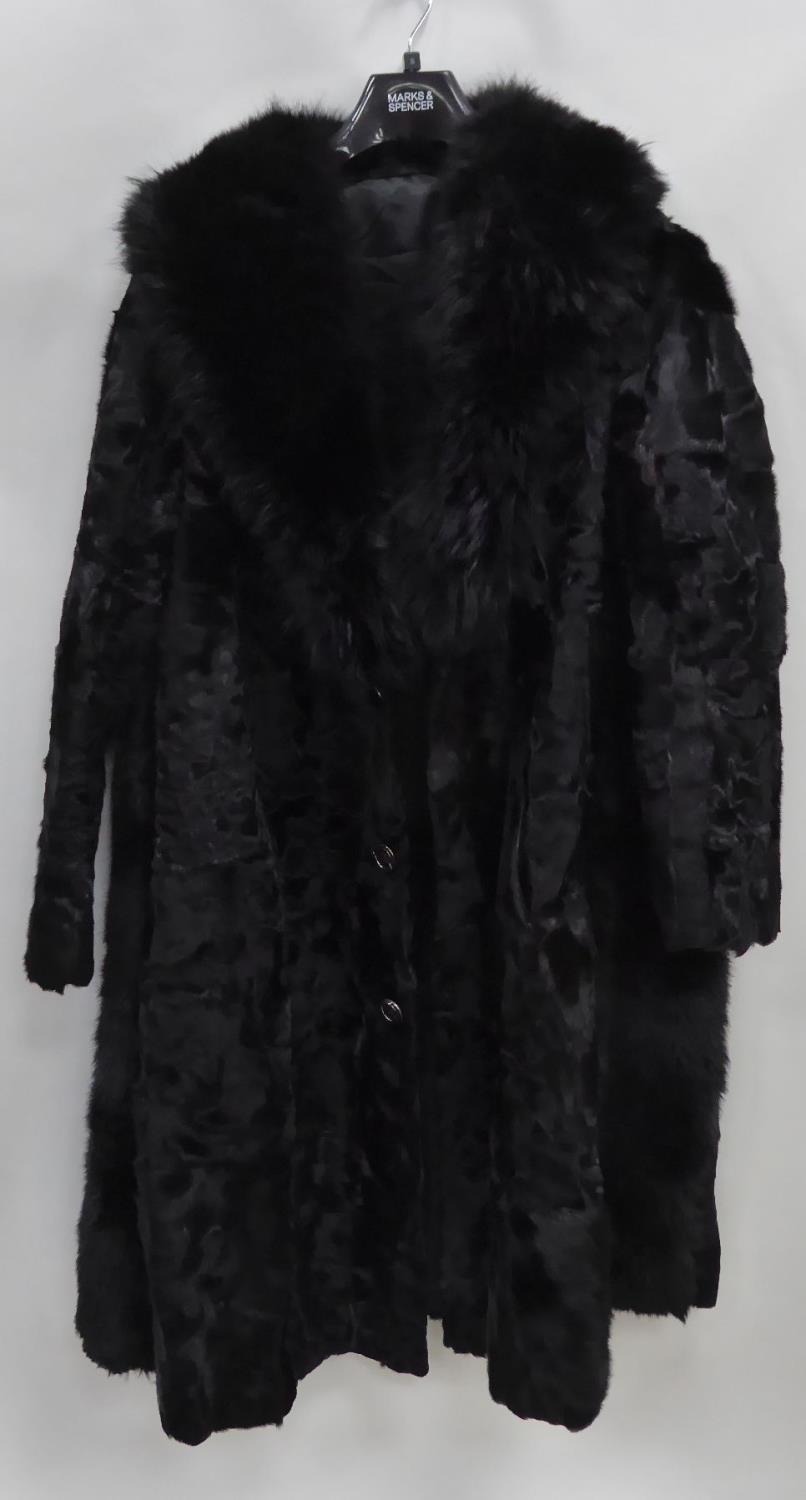 BLACK SEAL SKIN FULL-LENGTH COAT WITH BLACK DYED FOX FUR SHAWL COLLAR, hook fastening double