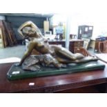 ART DECO GILT METALLIC PAINTED PLASTIC GROUP, RECLINING NUDE AND SEATED DOG ON OBLONG PLINTH BASE,