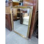 LARGE OBLONG BEVELLED EDGE WALL MIRROR, IN MOULDED GILT FRAME, 3'6" X 4'6" OVERALL