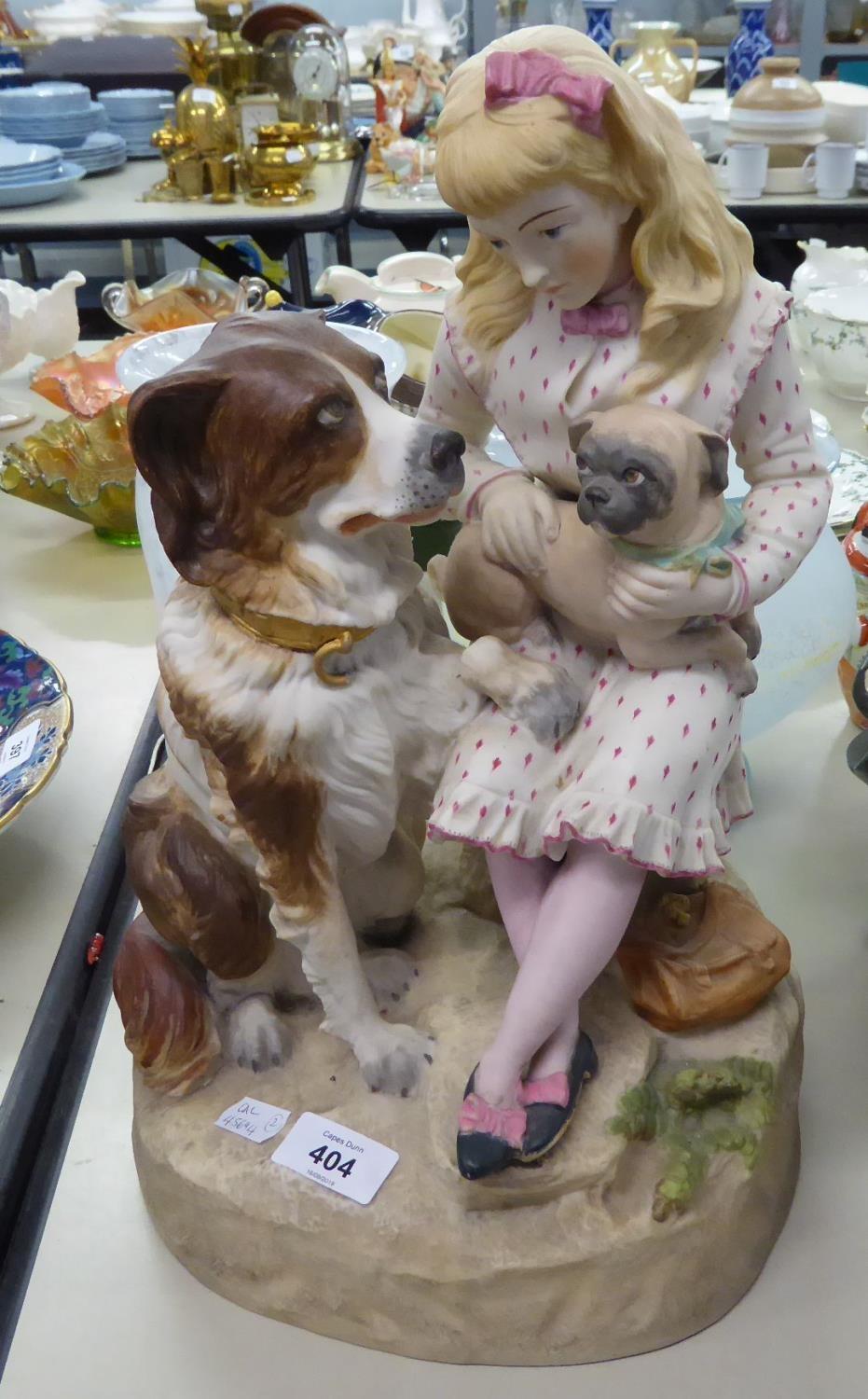 20TH CENTURY PORCELAIN BISQUE FIGURE GROUP OF A YOUNG GIRL SEATED WITH A PUG ON HER KNEE, AND A