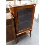 EDWARDIAN LINE INLAID MAHOGANY MUSIC CABINET WITH GLAZED DOOR ENCLOSING TWO SHELVES, ON FOUR