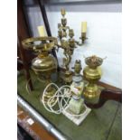 A BRASS FIVE LIGHT CANDELABRUM, TWO BRASS OIL LAMPS AND AN ONYX TABLE LAMP