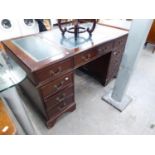 GEORGIAN STYLE MAHOGANY ENGLISH DOUBLE PEDESTAL DESK, THE BLUE LEATHER INSET TOP, THREE FRIEZE