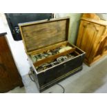 A LARGE BLACK PAINTED PINE TOOL CHEST AND A QUANTITY OF OLD HAND TOOLS