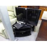 SAMSUNG FLAT SCREEN TV. 31" ON STAND AND A SAMSUNG DVD PLAYER