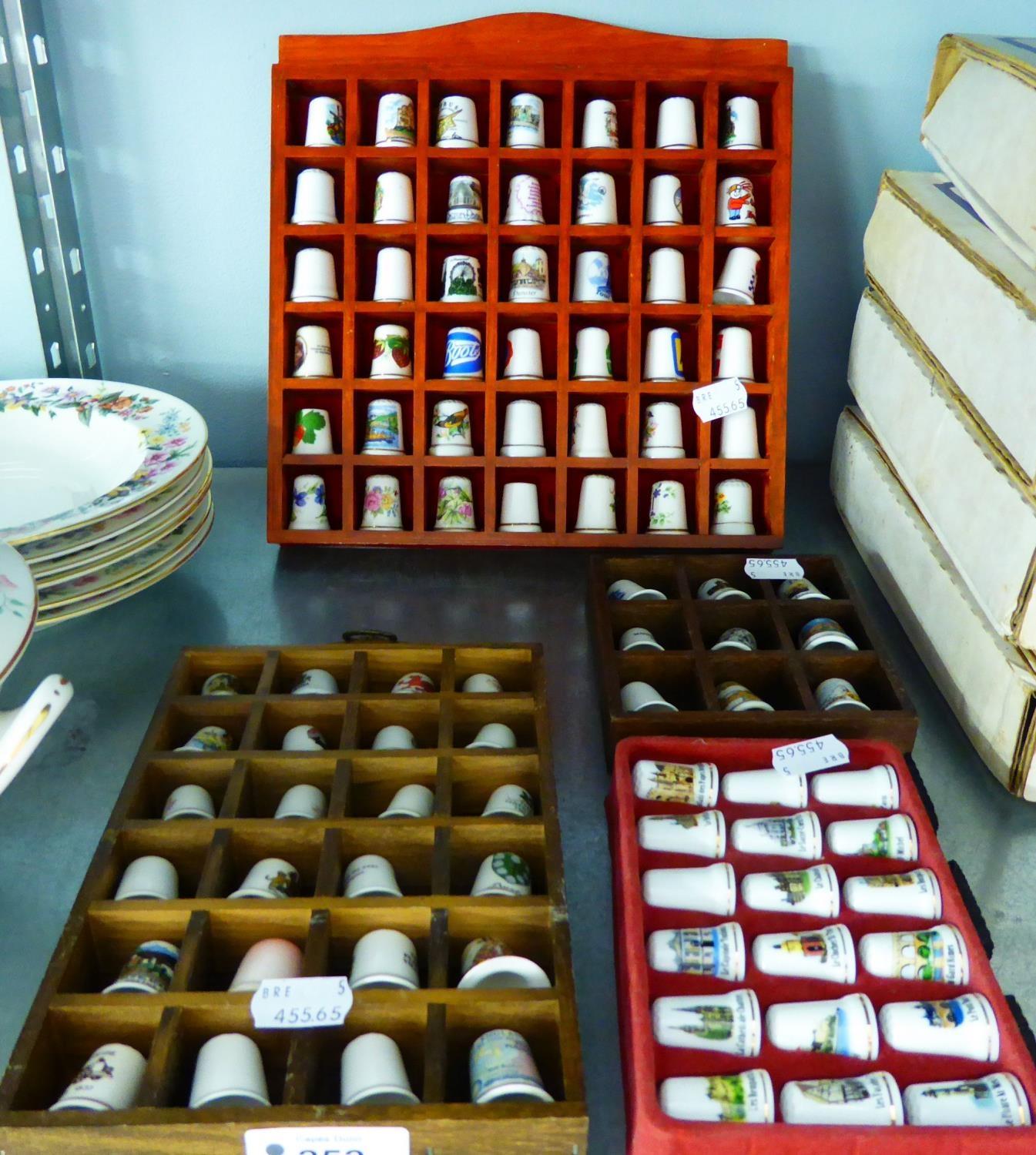 A LARGE QUANTITY OF PORCELAIN THIMBLES IN DISPLAY PLAQUE (95 PIECES APPROX)