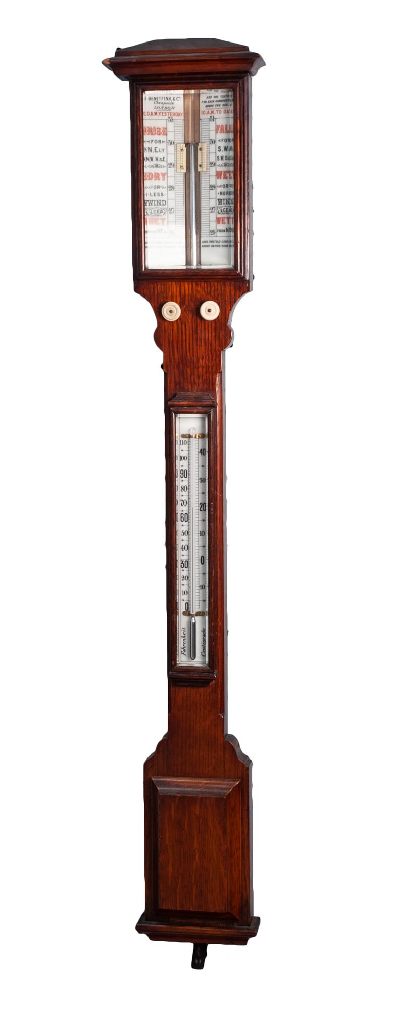 BENETFINK & Co, LONDON, OAK CASED COASTAL STICK BAROMETER, the glazed top with twin celluloid scales