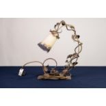 ART NOUVEAU STEEL DESK LAMP with flat oblong base supporting wrought steel C scroll band entwined