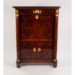 A FRENCH EMPIRE STYLE MAHOGANY SECRETAIRE applied with bronze dore mounts, having a veined black