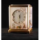 JAEGAR-LECOULTRE ?CHINESE WHITE PLEXI? ATMOS CLOCK, of typical form, the front decorated in raised