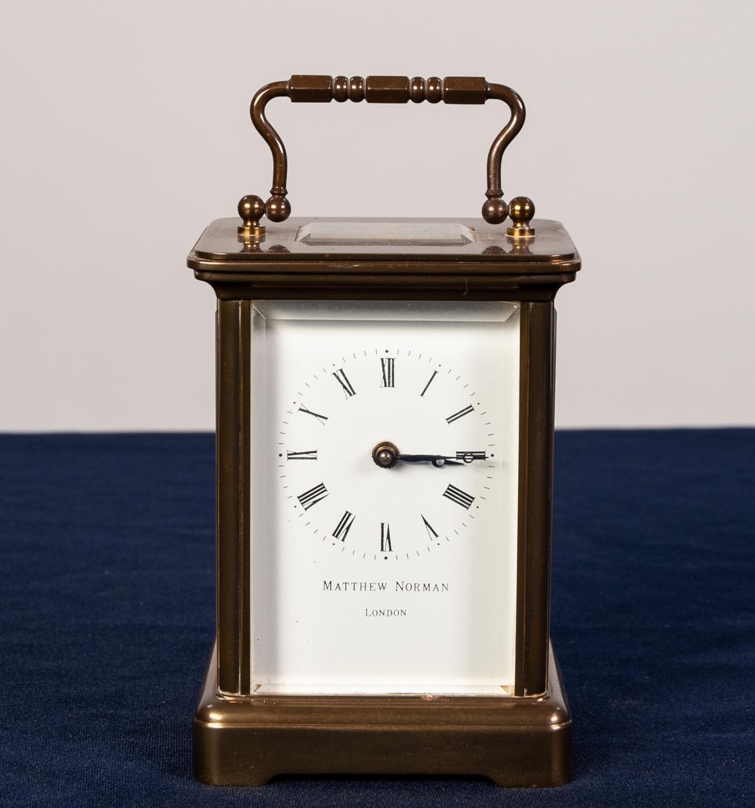 A POST WAR ENGLISH BRASS CASED CARRIAGE CLOCK the white enamel dial inscribed "Mathew Norman, - Image 2 of 4