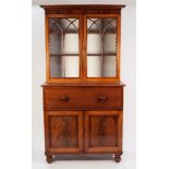 VICTORIAN FIGURED LIGHT MAHOGANY SECRETAIRE BOOKCASE OF SMALL PROPORTIONS, the moulded cornice above