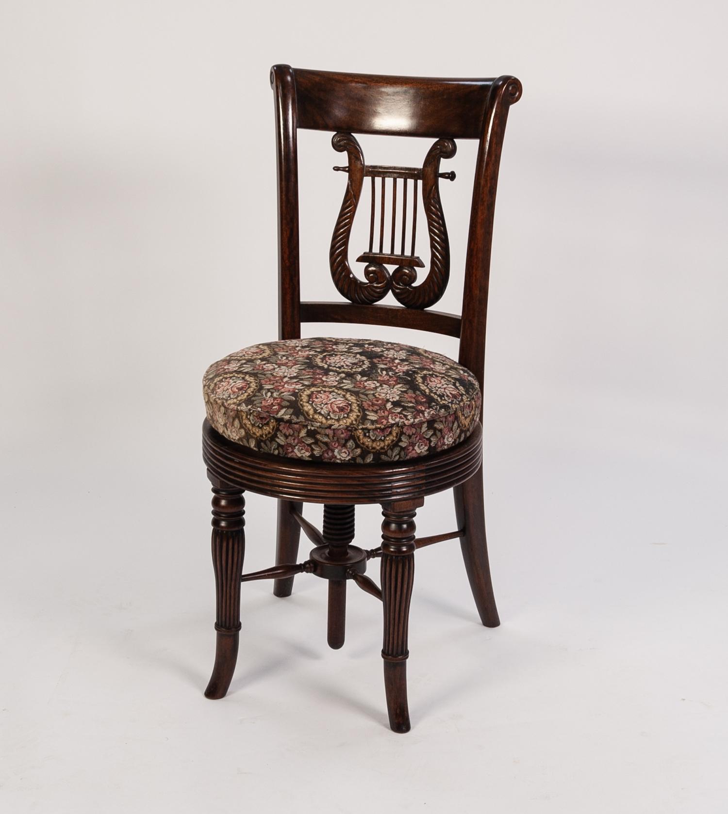 WILLIAM IV ROSEWOOD PIANO STOOL the high raised back having lyre shaped splat, the circular