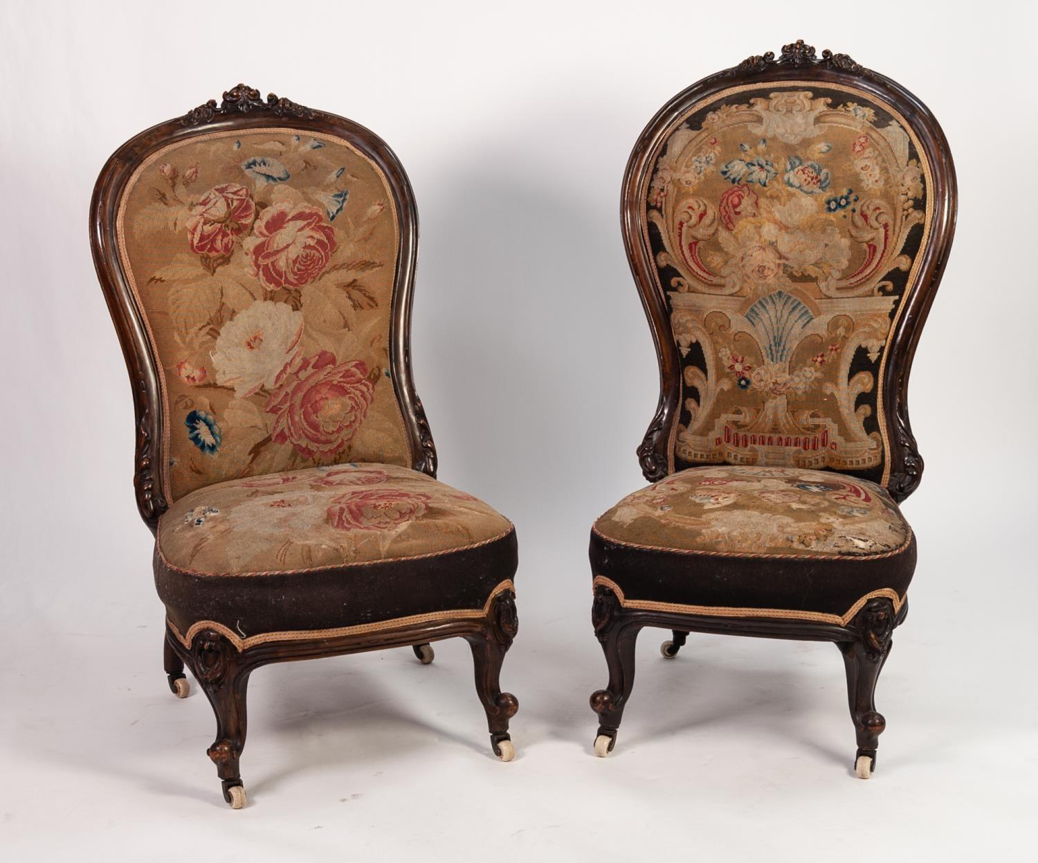 PAIR OF VICTORIAN CARVED WALNUT NURSING CHAIRS the show wood balloon backs and low seats upholstered