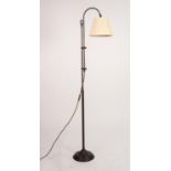 A 20th CENTURY BRONZED METAL HEIGHT ADJUSTABLE FLOOR STANDING ELECTRIC LIGHT 52" (132) high (