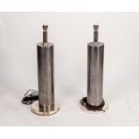 A PAIR OF 20th CENTURY FLOOR STANDING ELECTRIC LAMPS formed from wallpaper manufacturing rollers, on