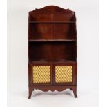 REGENCY MAHOGANY SMALL ?WATERFALL? OPEN BOOKCASE, of typical form with ebony diamond inlay to the