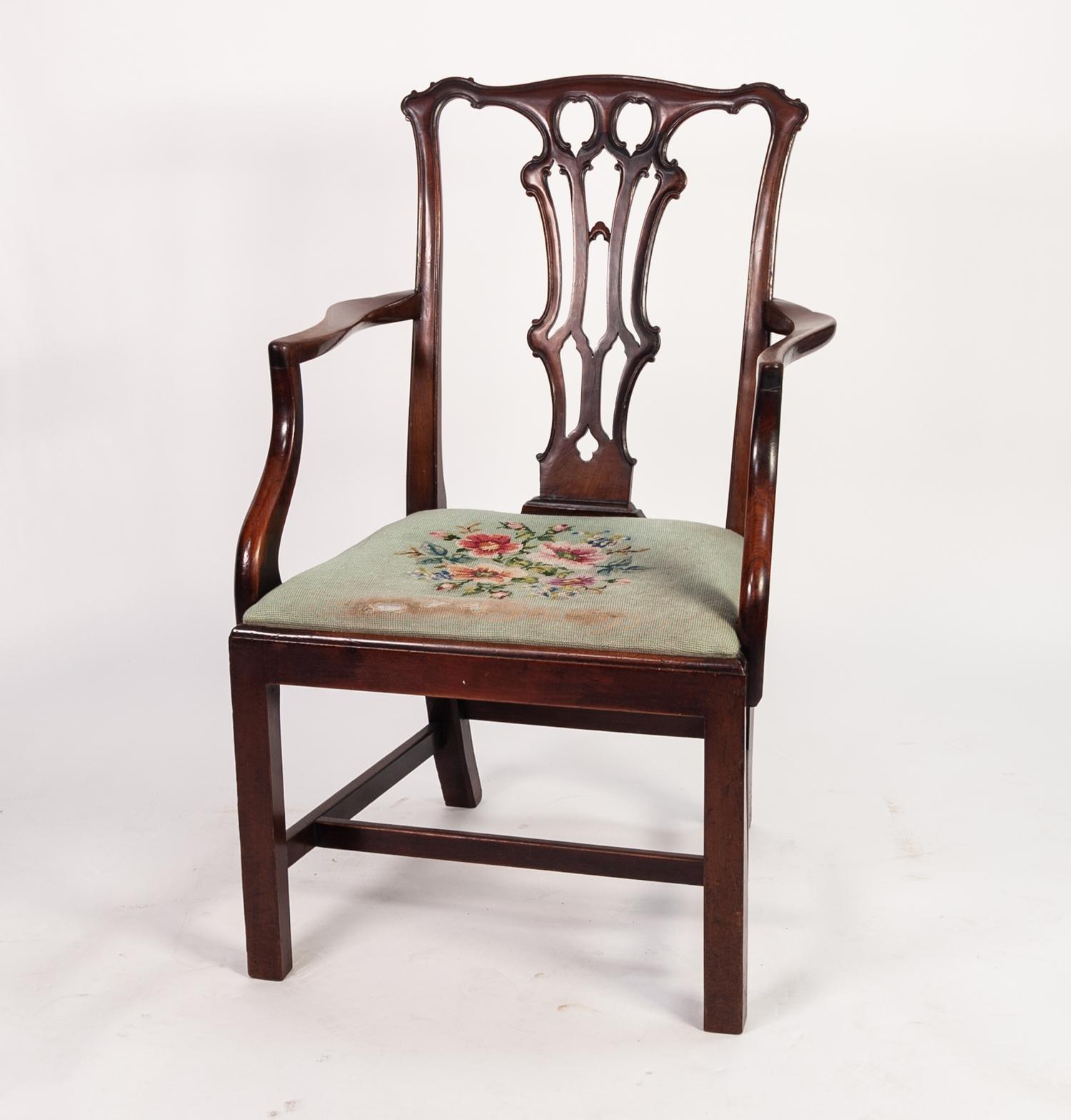 ANTIQUE MAHOGANY CHIPPENDALE CARVERS ARMCHAIR with pierced splat back, drop in seat covered in green