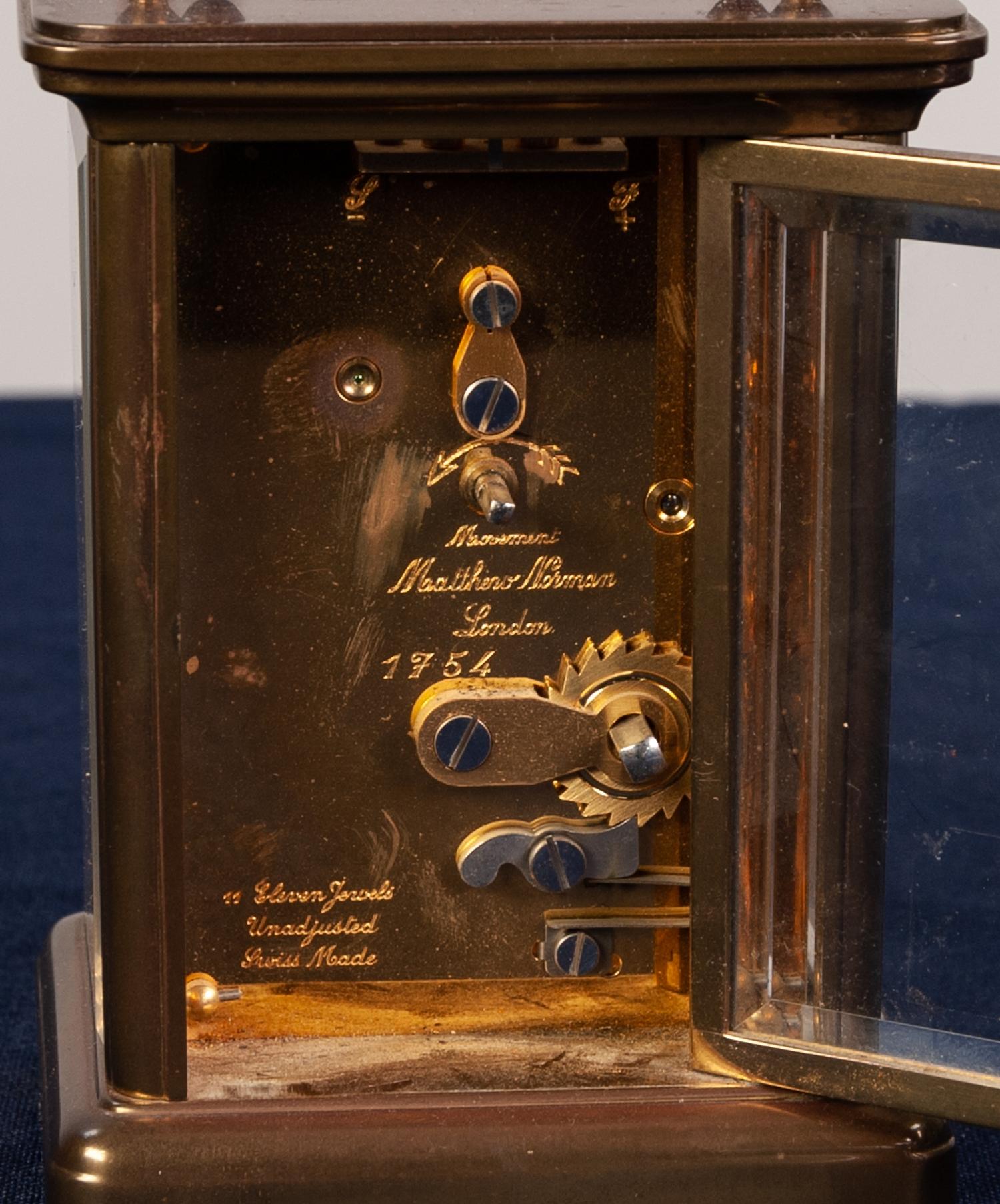A POST WAR ENGLISH BRASS CASED CARRIAGE CLOCK the white enamel dial inscribed "Mathew Norman, - Image 3 of 4