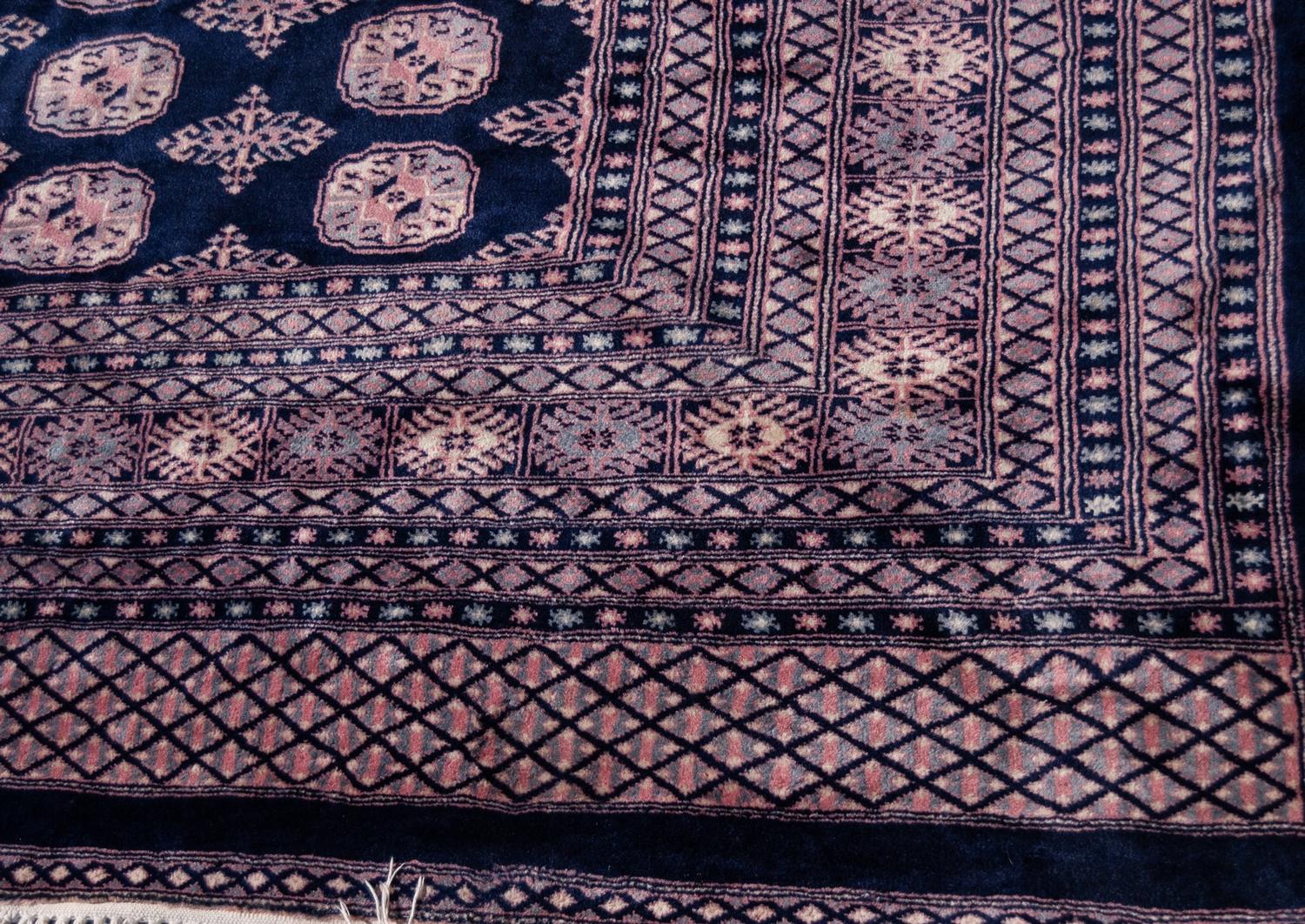 PAKISTAN BOKHARA WOOL CARPET with five rows of primary guls on a midnight blue field, multiple - Image 3 of 3