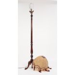 EARLY TWENTIETH CENTURY CARVED MAHOGANY FOUR LIGHT STANDARD LAMP, with tapering, turned column and