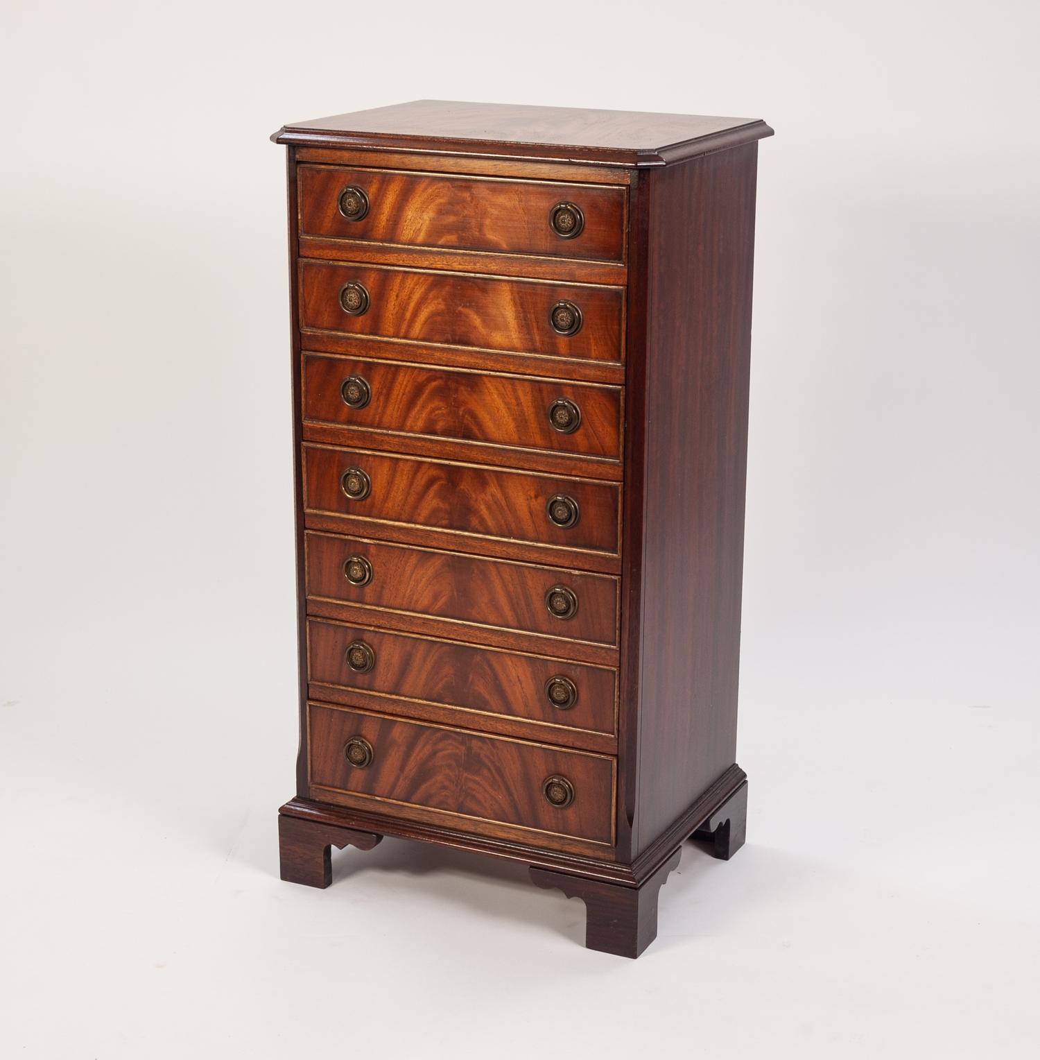 GEORGIAN STYLE FLAME CUT MAHOGANY SHEET MUSIC CABINET BY BEVAN FUNNELL Ltd, the canted oblong top