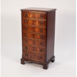 GEORGIAN STYLE FLAME CUT MAHOGANY SHEET MUSIC CABINET BY BEVAN FUNNELL Ltd, the canted oblong top