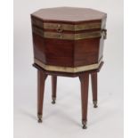 GEORGE III BRASS BANDED MAHOGANY OCTAGONAL CELLARETTE, with metal lined interior, brass side handles
