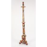 SPANISH BAROQUE CARVED PINE AND POLYCHROME PAINTED FLOOR STANDING CANDLE STAND, the scroll and