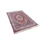 MODERN PERSIAN STYLE WOOL PILE RUG, the field with central lobated jewel medallion framed within a