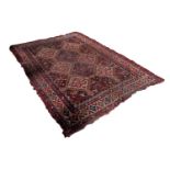 SHIRAZ PERSIAN RUG, with three rows of diamond shaped pole medallions, the centre row with