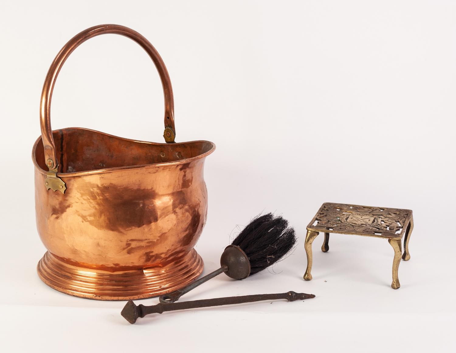 SEAMED COPPER SWING HANDLED COAL BUCKET, of oval form with brass handle to the rear, seam