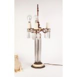 TWENTIETH CENTURY FRENCH GILT METAL AND CUT GLASS THREE LIGHT TABLE LAMP, the central fluted
