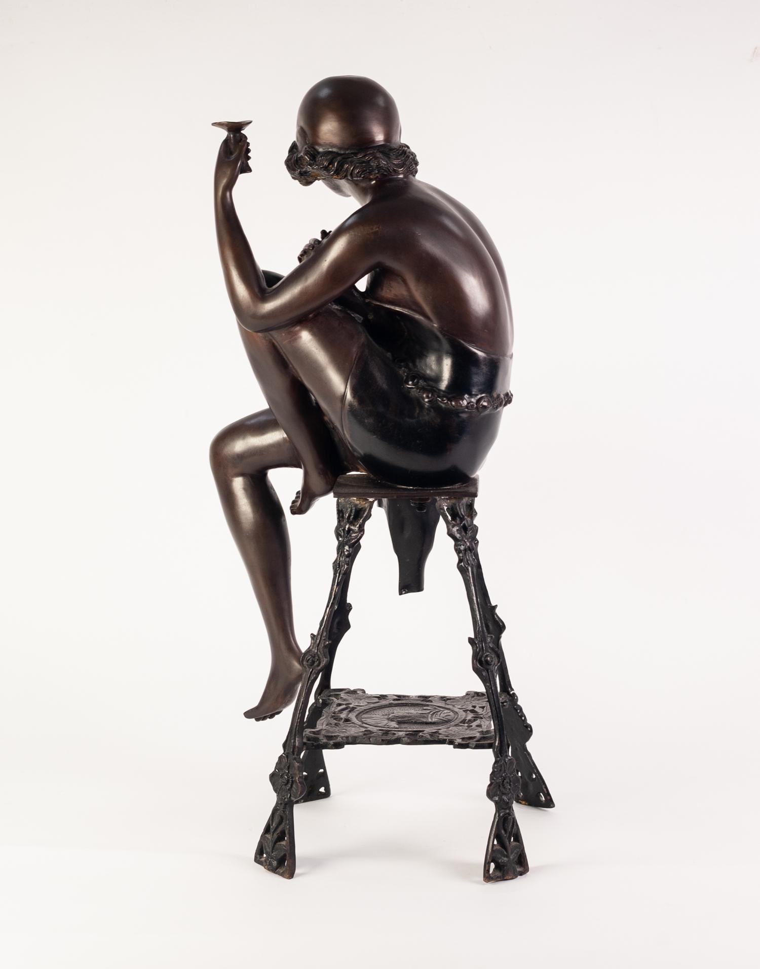 AFTER J.E. MIR, MODERN ART DECO BRONZE FEMALE FIGURE, ?CHAMPAGNE LADY?, modelled seated with - Image 3 of 4