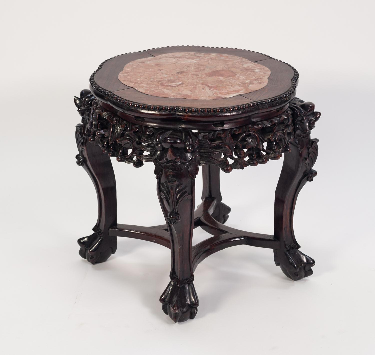 EARLY TWENTIETH CENTURY CHINESE PADOUK AND MARBLE URN STAND, the petal shaped top with pink veined