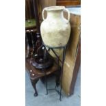 EARTHENWARE URN (APPROX 20" TALL) WITH TWO HANDLES, WITH TALL BLACK WROUGHT IRON STAND, 48" HIGH