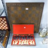 SET OF RESIN CHESS PIECES IN CASE, TOGETHER WITH A WOOD EFFECT CHESS BOARD