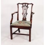 ANTIQUE MAHOGANY CHIPPENDALE CARVERS ARMCHAIR with pierced splat back, drop in seat covered in green