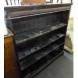 A STAINED MAHOGANY FOUR TIER OPEN BOOKCASE