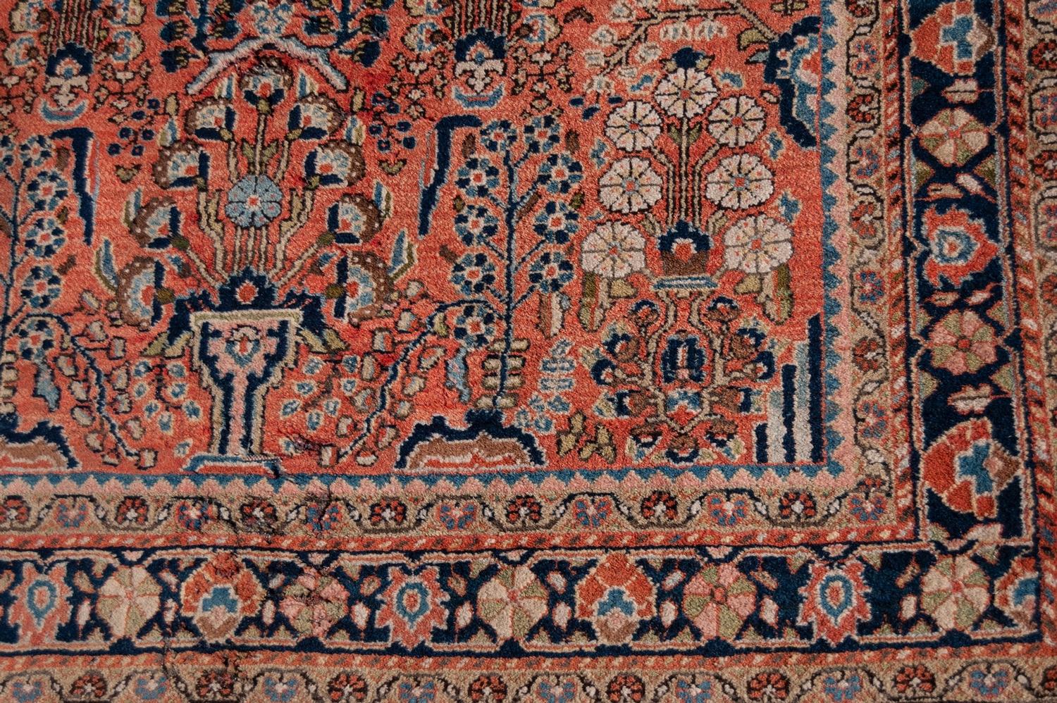SAROUK PERSIAN RUG with all-over design of vases of stylised flowering shrubs on a pink field, - Image 2 of 3