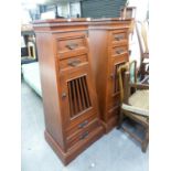 A PAIR OF STAINED WOOD PYRAMID SHAPED CABINETS, WITH 4 GRADUATED DRAWERS AND CENTRAL CUPBOARD (2)