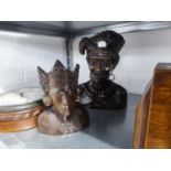 TWO SOUTH EAST ASIAN CARVED WOODEN HEADS