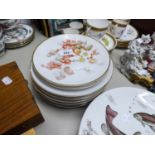 A SET OF SIX CONTINENTAL CHINA DESSERT PLATES, PRINTED WITH BERRIES AND BLOSSOMS AND TWO MATCHING